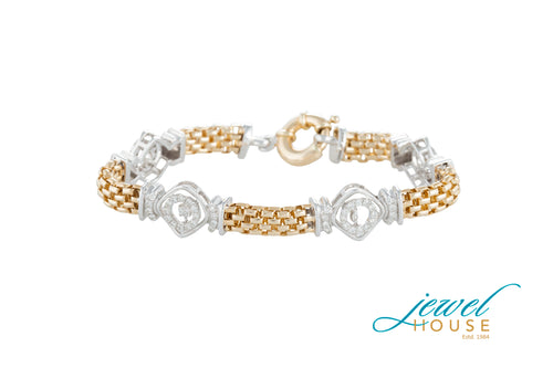 DANCING DIAMOND STATION BRACELET IN 14KT YELOW AND WHITE GOLD