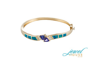 TRILLION CUT TANZANITES-DIAMOND BANGLE IN 14KT YELLOW GOLD