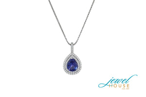 PEAR TANZANITE AND DOUBLE ROW PEAR HALO DIAMOND PENDANT IN 18KT WHITE GOLD