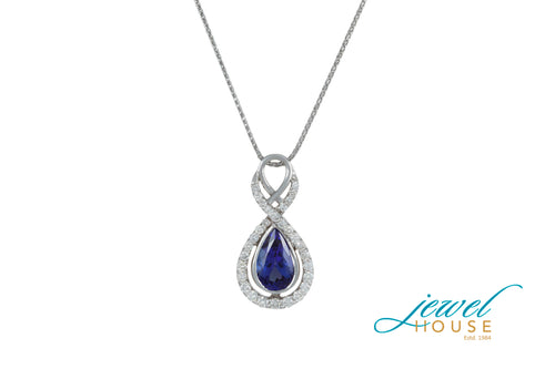 PEAR TANZANITE AND INFINITY STYLE DIAMOND PENDANT IN 14KT WHITE GOLD