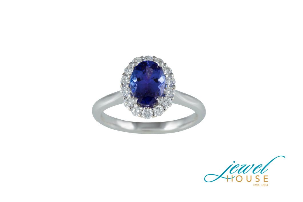 OVAL TANZANITE AND HALO MICROPAVE DIAMOND RING IN 18KT WHITE GOLD