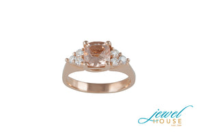 CUSHION MORGANITE CENTER AND TRIO DIAMONDS ON EACH SIDE RING IN 14KT ROSE GOLD